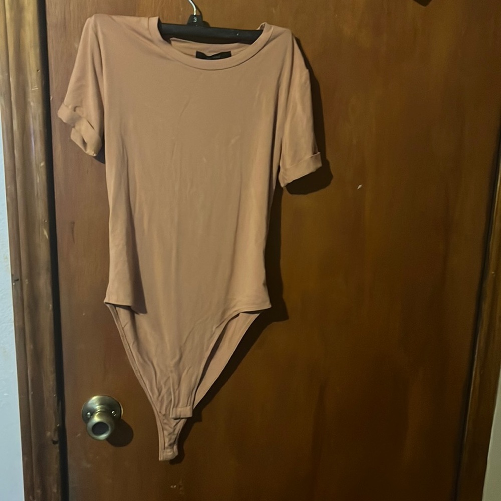 A body suit, size small